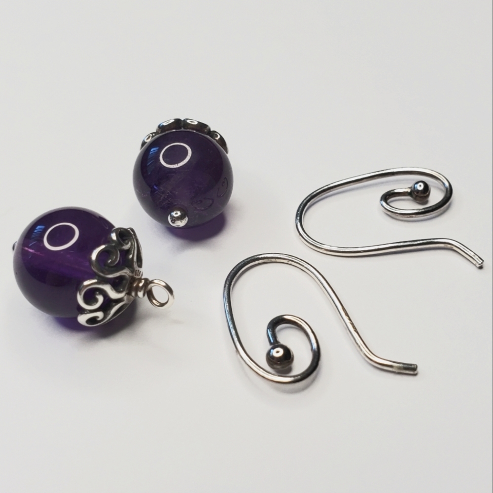 Authentic Pandora amethyst earrings